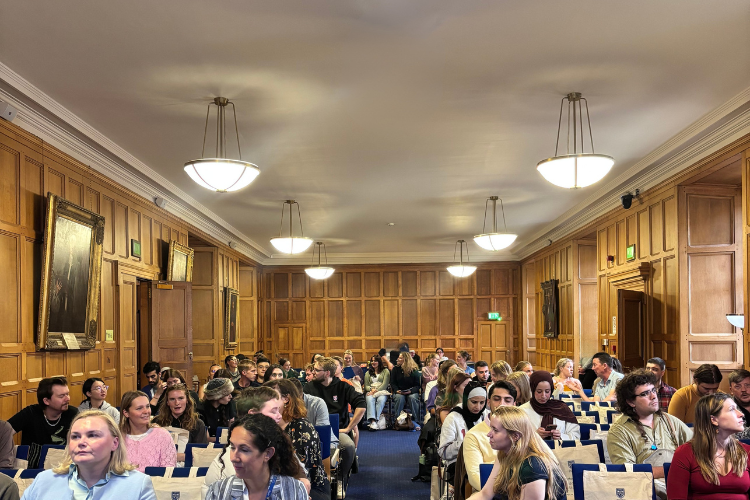 Photo of a full Parliament Hall set out lecture-style with Graduate School goodie bags on the seats